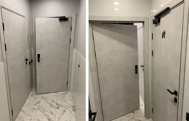 AquaDoor в цвете арт-бетон с черной кромкой в апарт-отеле в Санкт-Петербурге.  